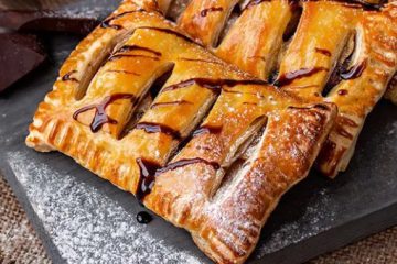 French pastry cookies with peach-strawberry filling