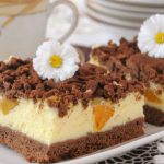 Cheesecake with Peaches on a Cocoa Base
