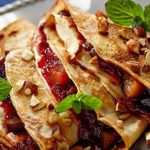 Cinnamon pancakes with plums