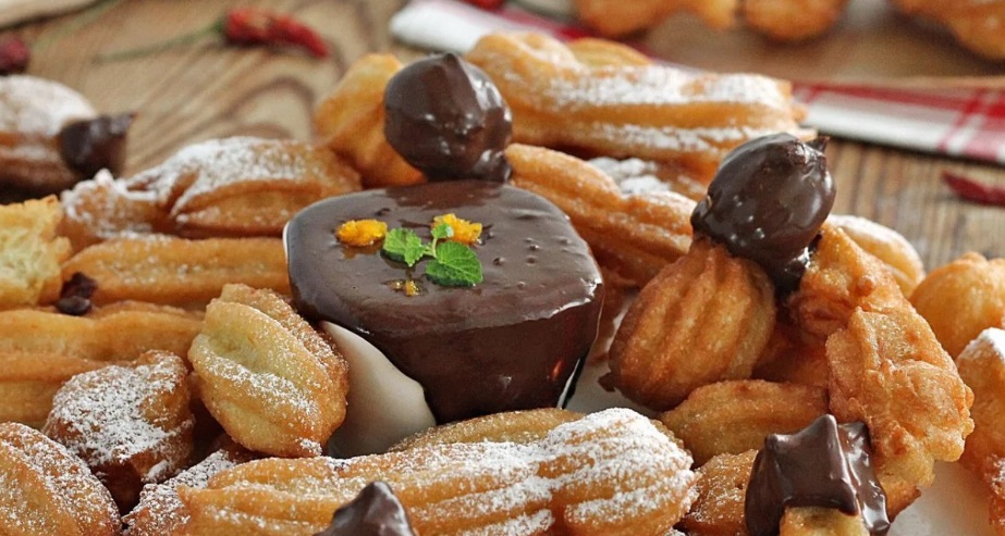 Orange Churros with Spicy Sauce