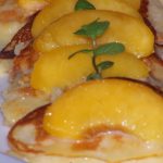 Pancakes with Chocolate Drizzle and Peaches