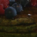 Spinach Pancakes with Fruits and Syrup