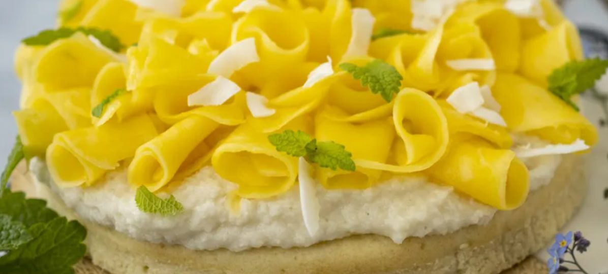 Vegan coconut cake with mango cream