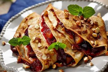 Cinnamon pancakes with plums