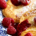 Cottage cheese pancakes with raspberry sauce