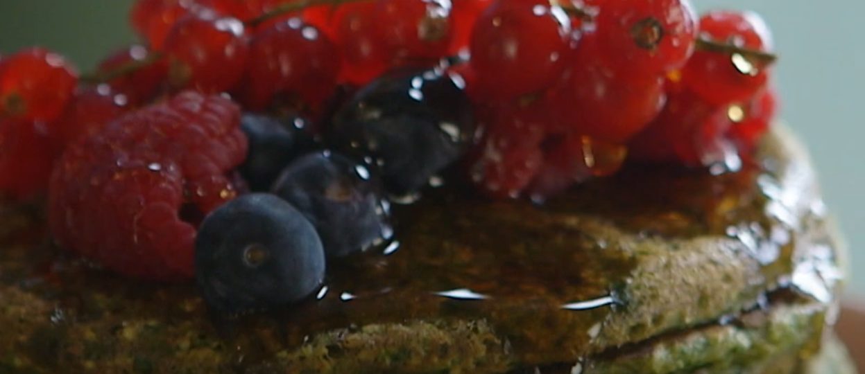 Spinach Pancakes with Fruits and Syrup