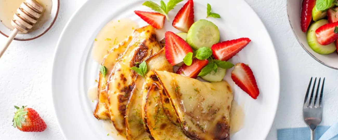 Yogurt pancakes with coconut syrup and strawberry-cucumber salad
