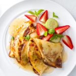 Yogurt pancakes with coconut syrup and strawberry-cucumber salad