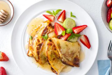 Yogurt pancakes with coconut syrup and strawberry-cucumber salad